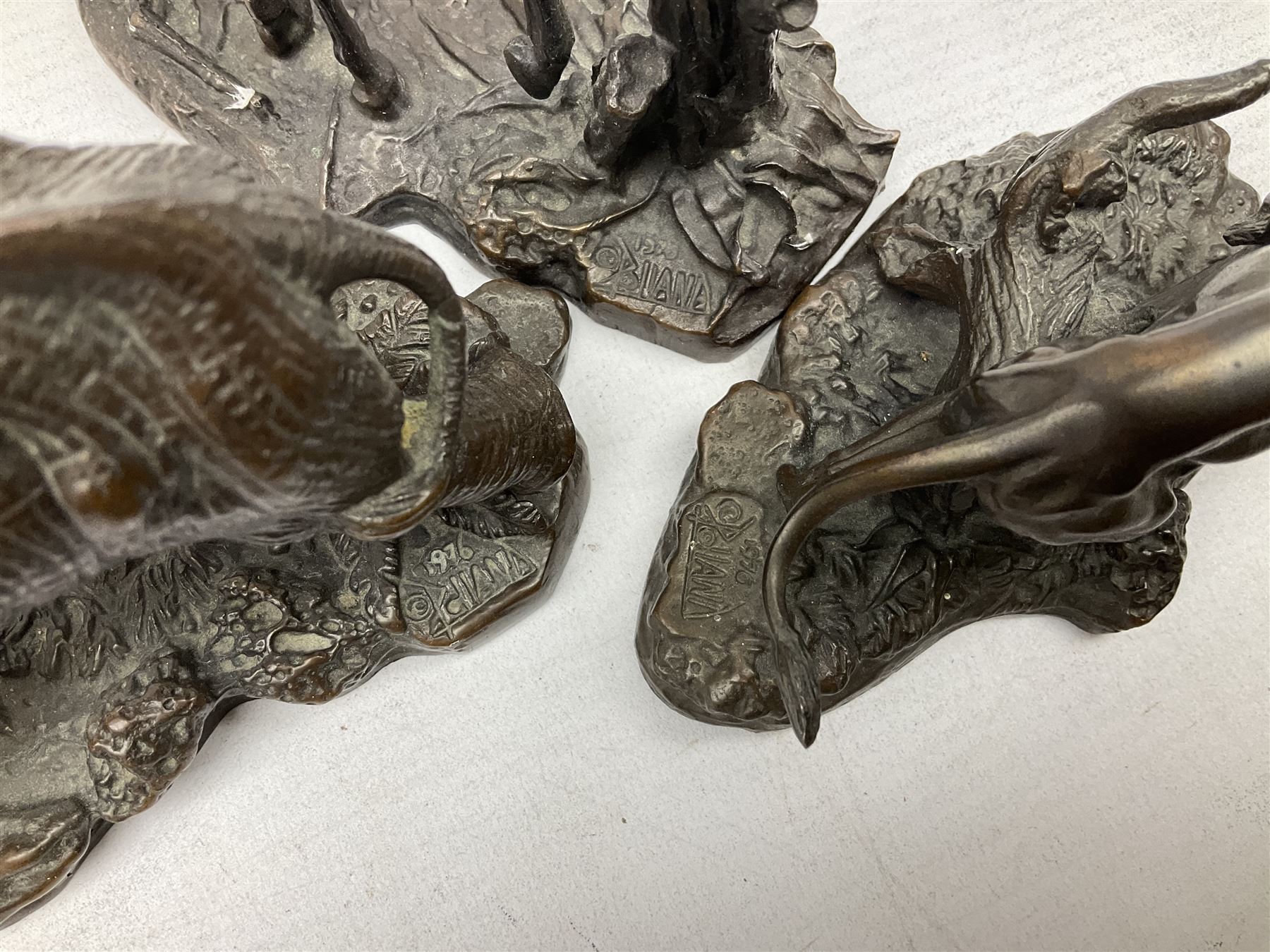 Six Franklin Mint bronze models of African animals, comprising Lion, Black Rhinoceros, Greater Kudu, Cheetah, Giraffe and African Elephant, tallest example H14cm