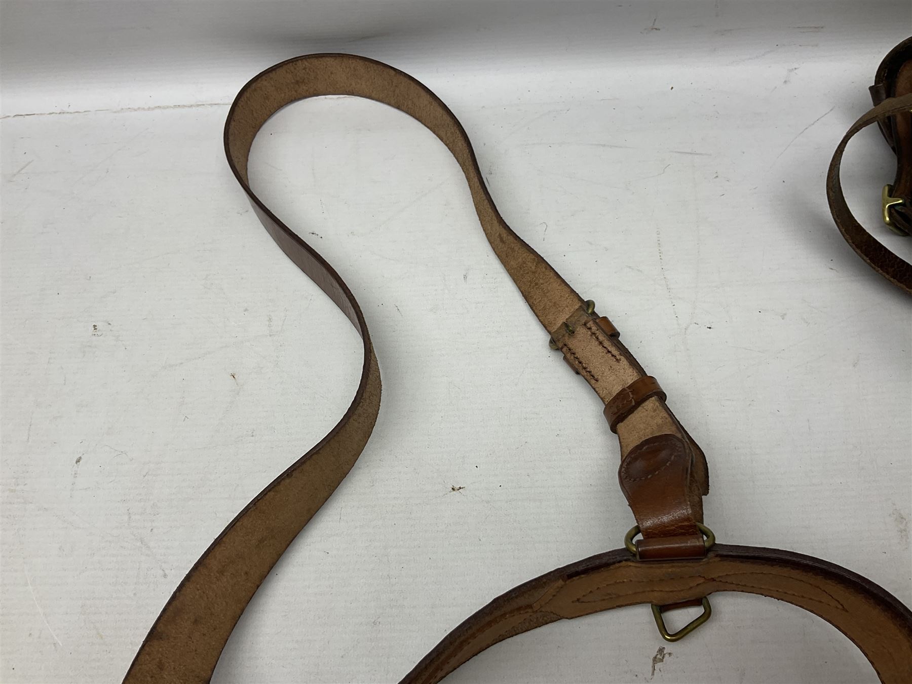 Pair of WW1 style Army Officer's brown leather full leg riding boots with Alkit four-piece wooden boot trees; and two officer's Sam Browne leather belts with cross-straps, one with sword frog (4)