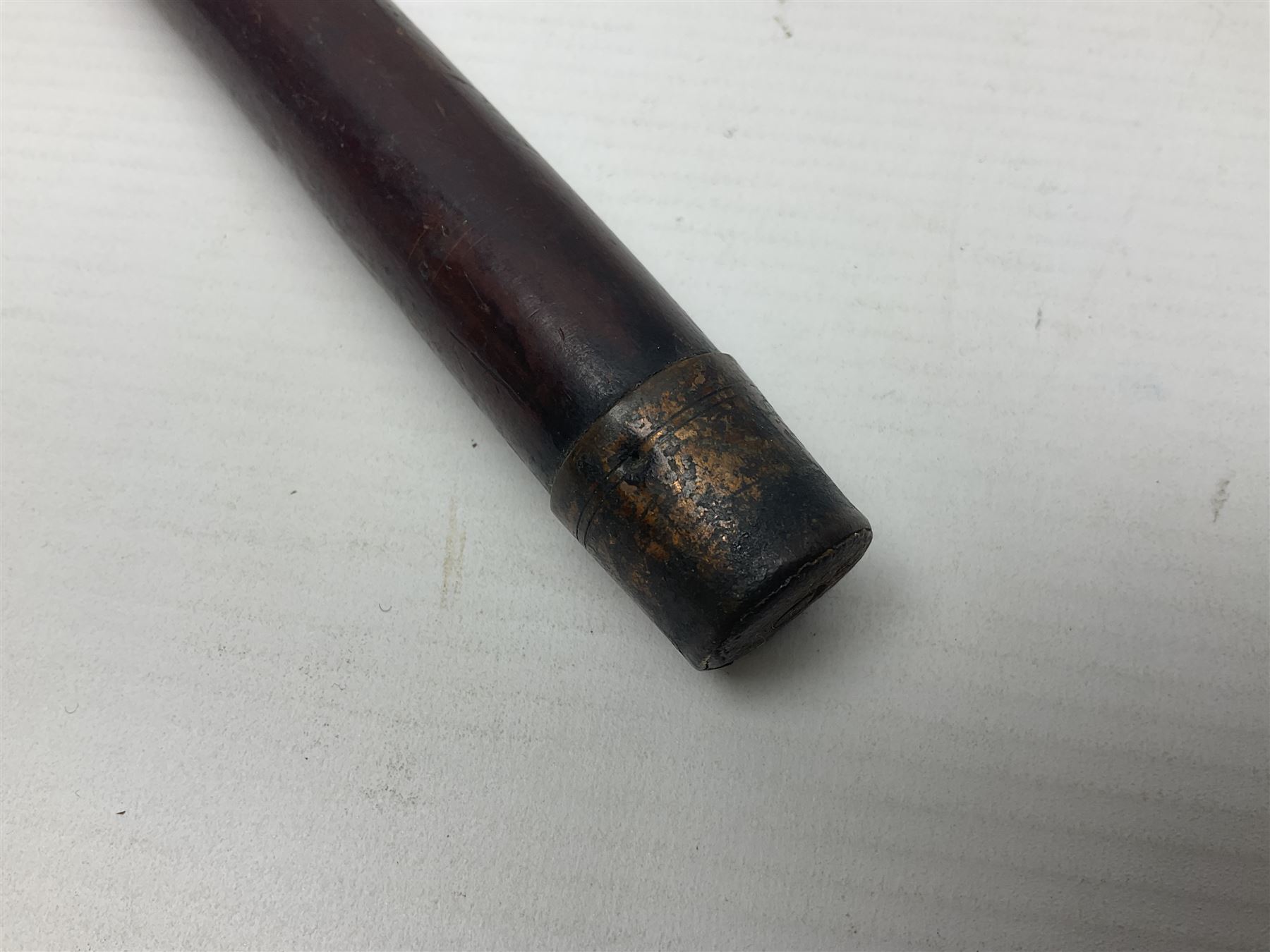 Victorian magician's cane, the mahogany walking stick twisting apart to reveal an internal mechanism, opening to tripod and black silk fold out magician's table, with horn handle and silver mount, hallmarked Birmingham 1891