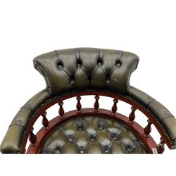 Captain's swivel desk chair, upholstered in studded green leather