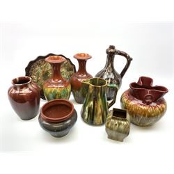 Collection of early to mid 20th century drip glazed pottery to include a bulbous vase with three loop handles, possibly Bretby, pair of baluster vases with flared rim, square section vase, oval tray, jug etc 