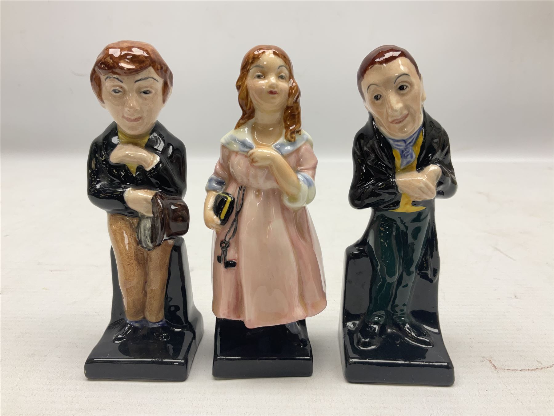 Sixteen Royal Doulton Charles Dickens figures, to include Oliver Twist, Fat Boy, Fagan, Stiggins etc, all with printed marks beneath