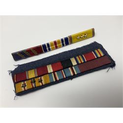 Collection of approximately sixty worldwide medals, metal badges, belt buckles, cloth badges, trench art, brass button stick etc