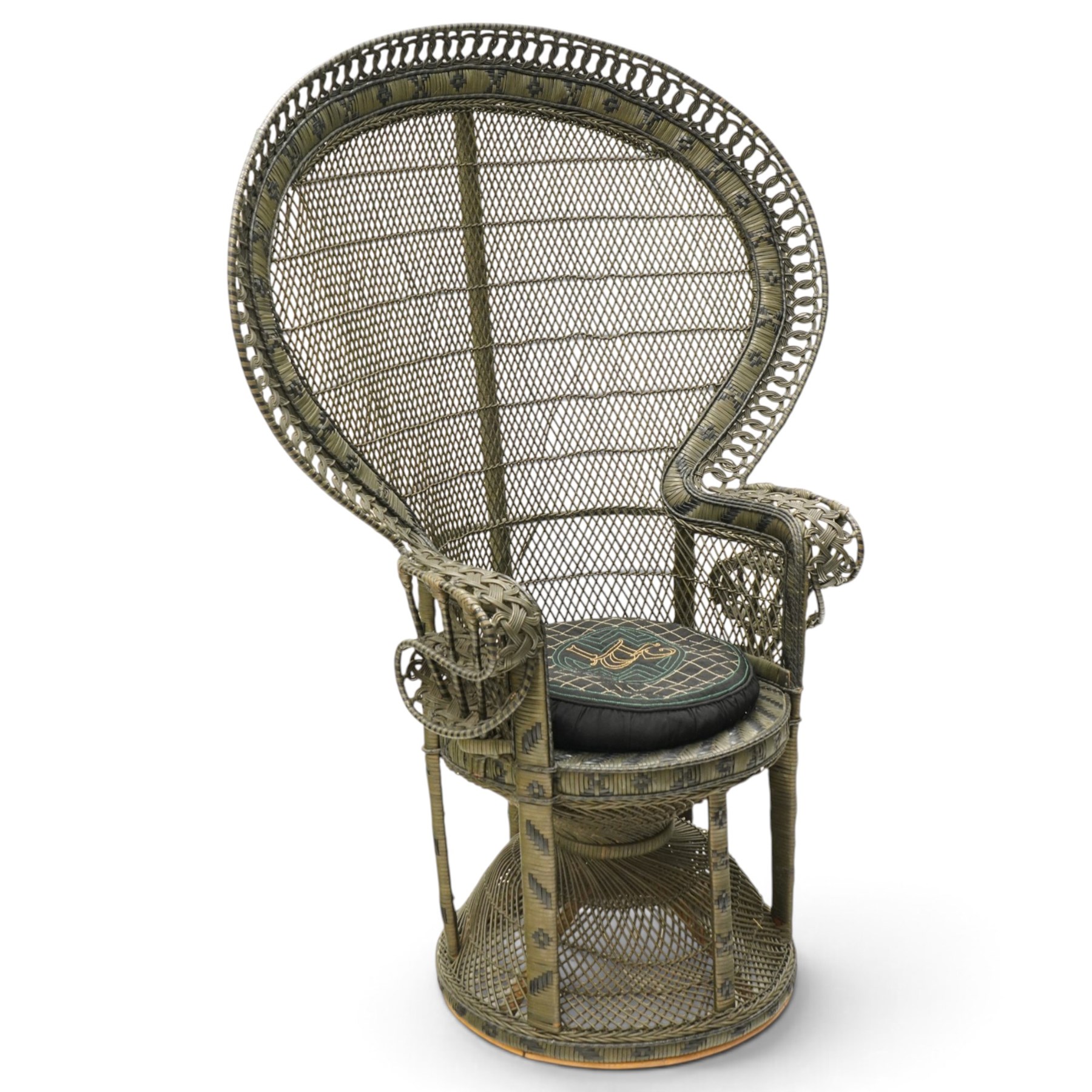 Mid-20th century wicker and rattan Peacock chair in unusual tones of dark olive and black, high fan back with a pieced and woven frame terminating to scrolled arms, with loose seat cushion