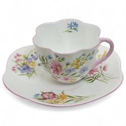 Shelley 'Wild Flowers' pattern part tea service, comprising four coffee cups, five coffee cup saucers, nine teacups, eight teacup saucers, coffee pot, three milk and cream jugs, two bowls, five cake plates etc