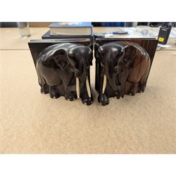 Pair of carved elephant bookends with bone tusks, H14.5cm