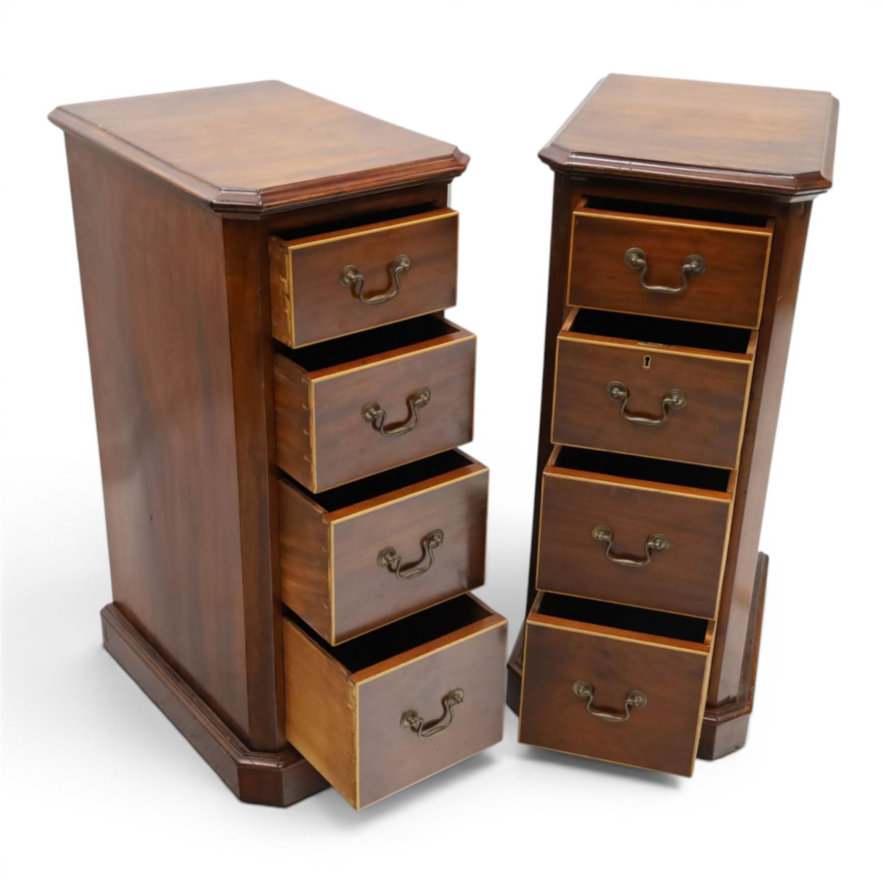 Pair of Edwardian mahogany pedestal chests, of moulded rectangular form, above four graduated drawers, brass swan neck handles, moulded plinth base