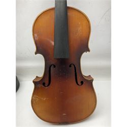 Czechoslovakian violin c1920 with 36cm two-piece maple back and ribs and spruce top, bears label 'Copy of Antonius Stradivarius Made in Czechoslovakia' L59cm; in carrying case; 1950s Czechoslovakian violin; and 195os Czechoslovakian three-quarter size violin; both cased (3)