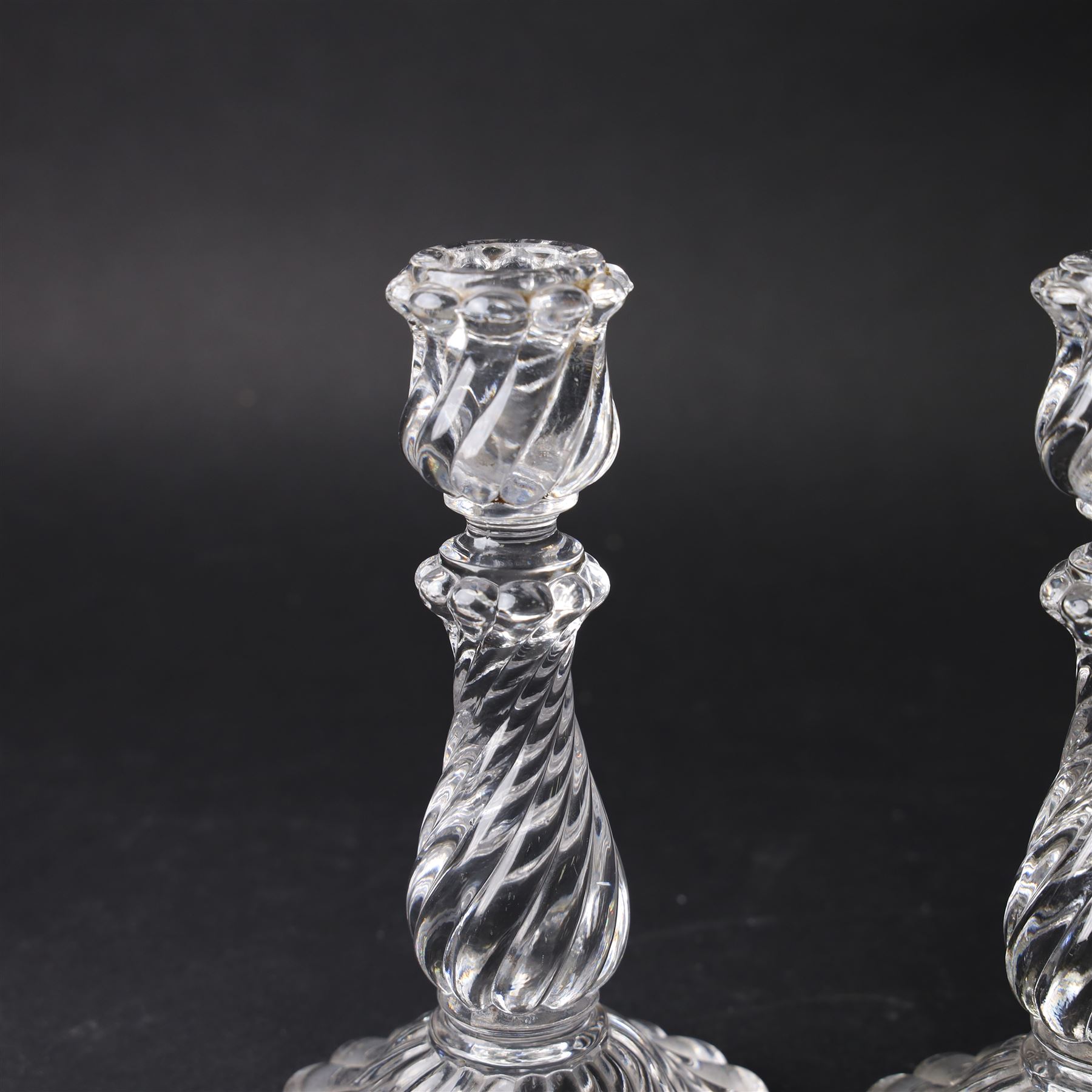 Pair of Baccarat Bambous glass candlesticks, with wrythen moulding, marked beneath, H19cm