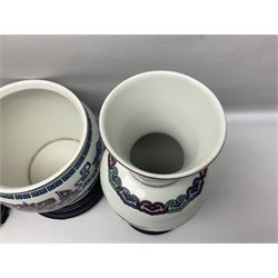 Franklin Mint Chinese style ceramics, comprising two vases, puppy and a planter, all on wooden stands