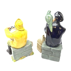Two Royal Doulton figurines,  The Boatman HN2417, and Shore Leave HN2254, each with green printed mark beneath.
