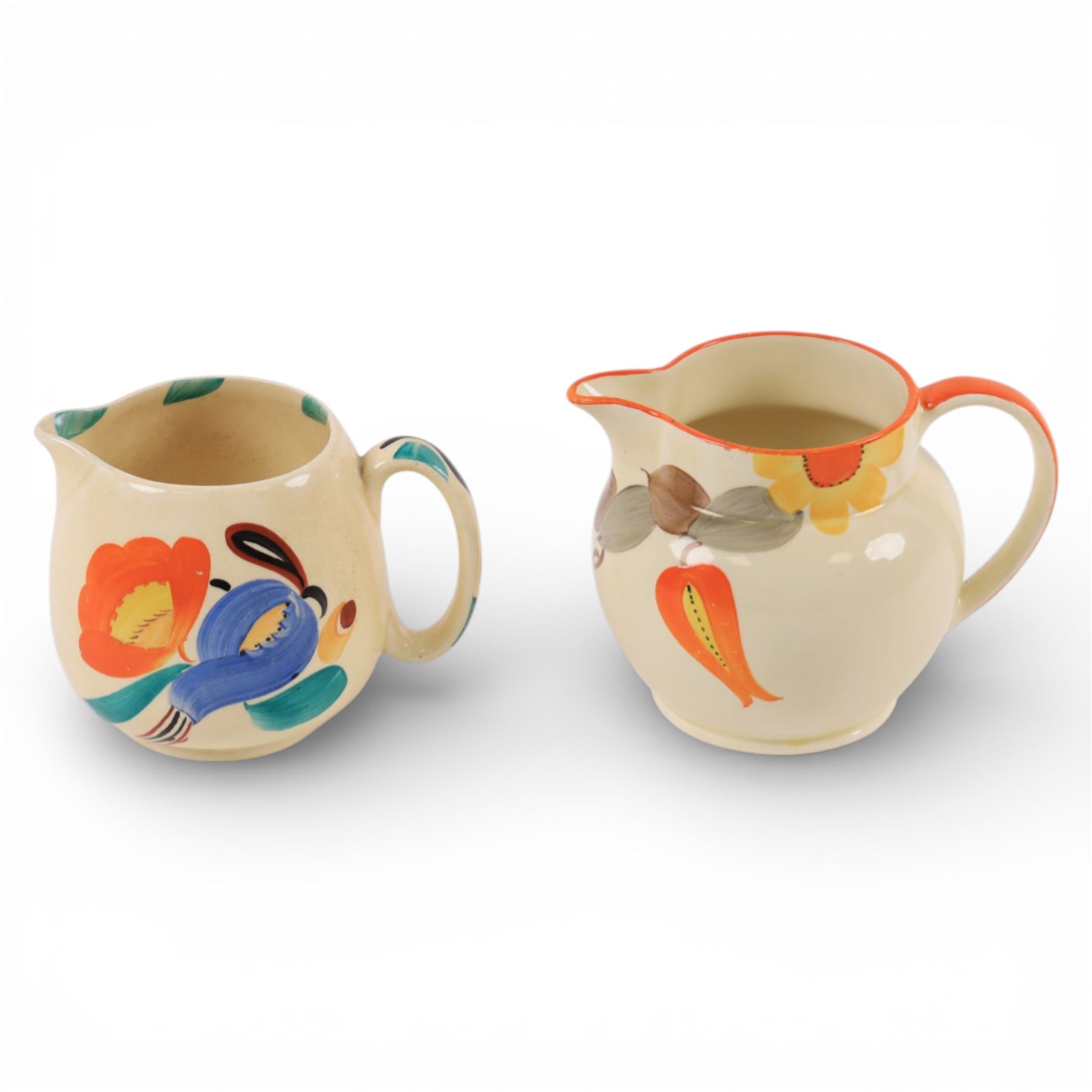 Collection of Susie Cooper ceramics, including jugs, vases and a teapot 