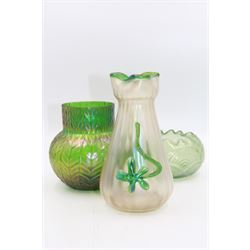Three Austrian Art Nouveau iridescent glass vases, including a Kralik example of tapering form, with pearlescent lustre body and applied green flower decoration, tallest H18cm