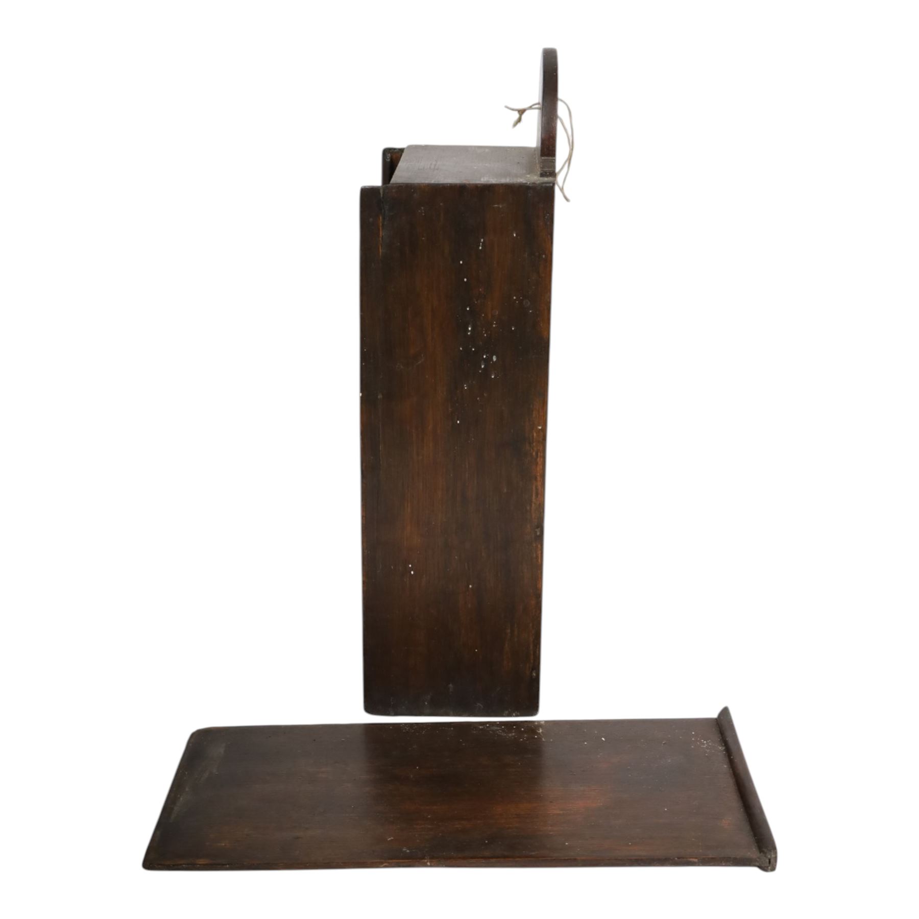 Three George III and later oak candle boxes, the first example of tapering form with shaped and pierced scroll crest, above a hinged lid, H50.5cm W18cm D13cm, the second of plain rectangular form with tapering crest, above a studded leather hinged sloped lid, H46cm W15.5cm D15.5cm, and third of plain rectangular form with demi-lune crest, with lift up front, H42.5cm W17.5cm D12cm 
