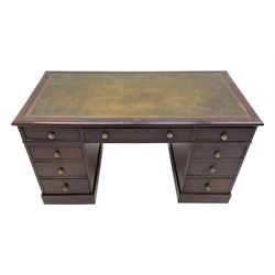 Early 19th century mahogany twin pedestal desk, moulded rectangular top with green leather inset, fitted with nine drawers, on plinth base
