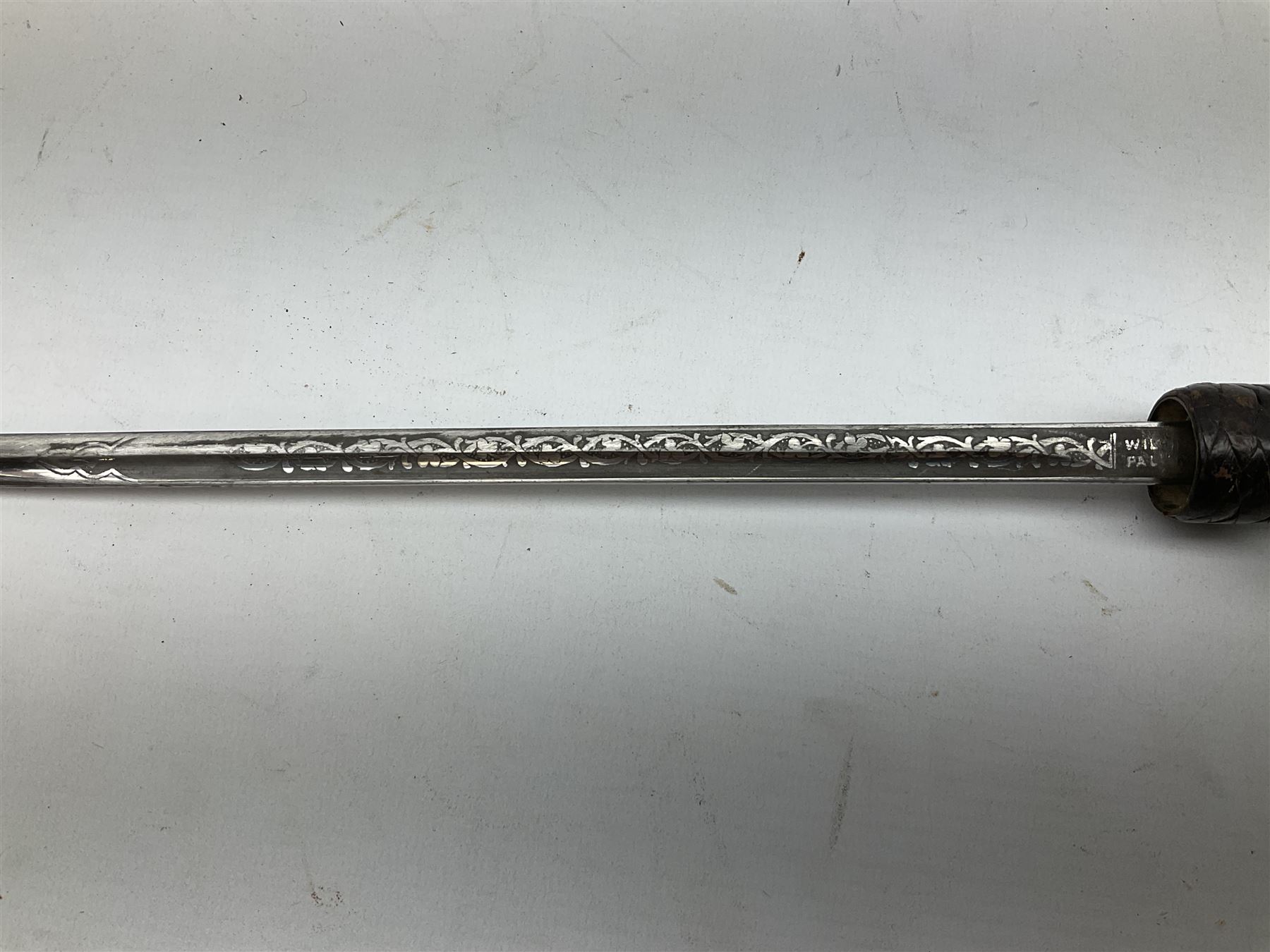 Early 20th century officer's swagger type leather covered sword stick, the 33cm etched single fullered blade marked Wilkinson Pall Mall, with carrying strap L60.5cm