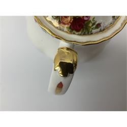 Royal Albert Old Country Roses pattern tea set, comprising teapot, coffee pot, six teacups and six saucers, five side plates, further teacup with joined saucer and side plate, open sucrier, milk jug, cake plate, and preserve pot and cover, together with Royal Albert Jubilee Rose pattern sauce boat and stand, and Royal Albert Lavender Rose pattern cake stand. 