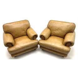 Two seat sofa upholstered in a studded tan leather, turned supports (W160cm) and pair matching armchairs (W108cm)
