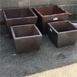 Two sets of two rustic cube plant pots, W56cm