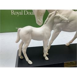 Five Beswick and Royal Doulton horse figures in matt white on black plinths, comprising of  Spirit of Affection no. 2689/2536, Springtime no.2837, Spirit of peace no.2916, Spirit of earth no.2914 and Spirit of the wild no. 183, together with a composite figure of a horse (6)
