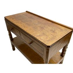 Mouseman - circa. 1950s oak serving table, adzed rectangular top over two drawers, on octagonal supports joined by adzed undertier, the rear right leg carved with mouse signature, by Robert Thompson of Kilburn