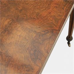 Victorian walnut card table, hinged rectangular moulded top with rounded corners and figured veneers, revealing a green baized lined interior, plain frieze with beaded lower edge, raised on ring turned tapering supports terminating in ceramic castors