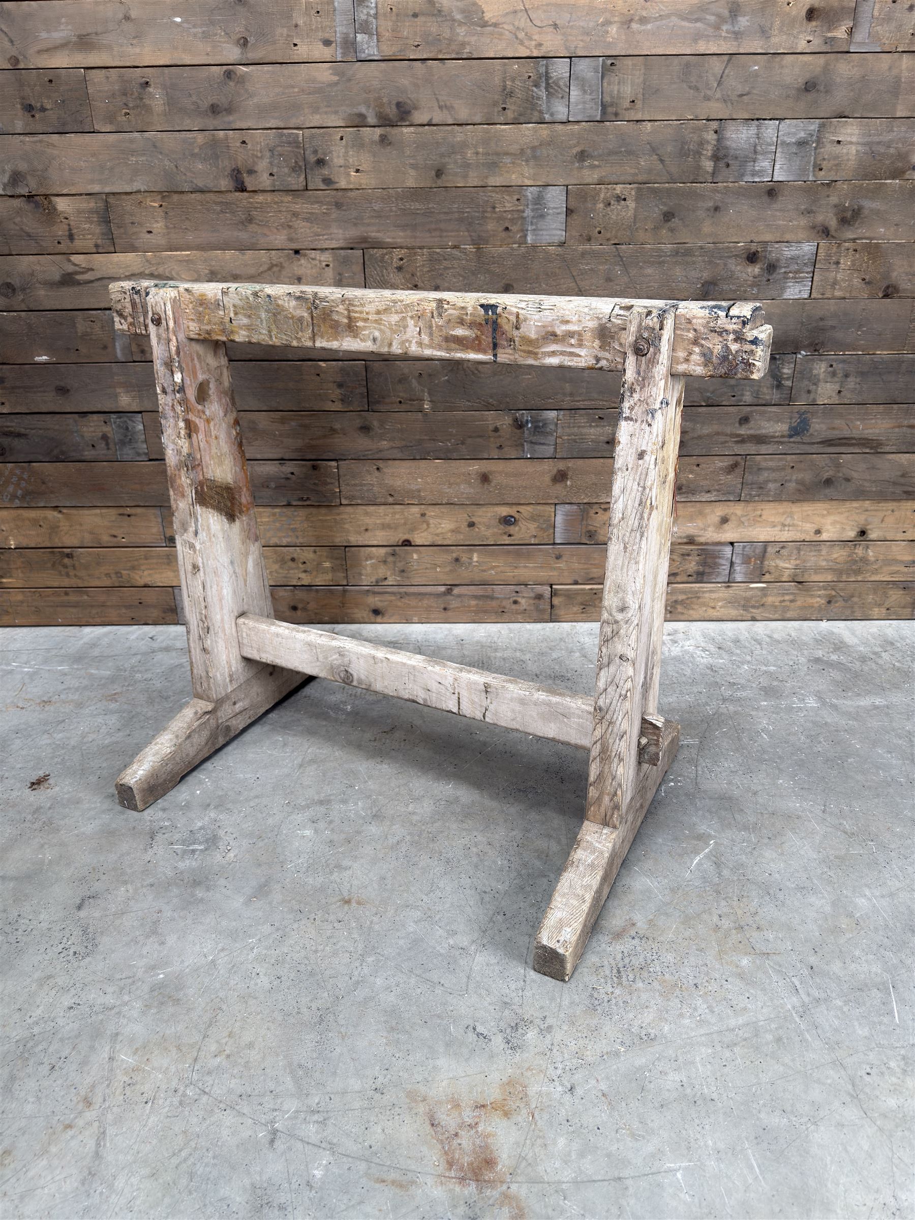 Pair of late 19th century pitch pine trestles, square tapering form in stripped finish