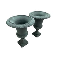 Pair of Victorian design teal painted cast iron campana shaped garden urns, egg and dart rim over a gadrooned underbelly, tapering column on square plinth base - THIS LOT IS TO BE COLLECTED BY APPOINTMENT FROM DUGGLEBY STORAGE, GREAT HILL, EASTFIELD, SCARBOROUGH, YO11 3TX
