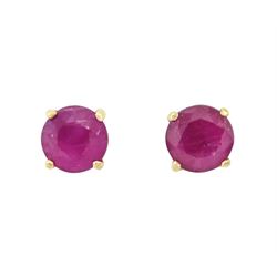 Pair of 9ct gold ruby stud earrings, stamped