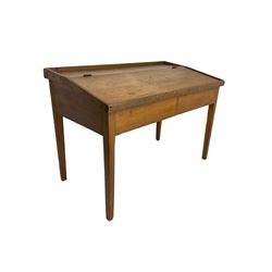 Late 19th century walnut school desk, sloped hinged lid, on square tapering supports 