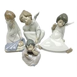 Four Lladro figures, comprising Wondering Angel no. 4962, Heavenly Chimes no. 5723,  Angel Dreaming no. 5961 and Angle with Child no.4635, largest H18cm 