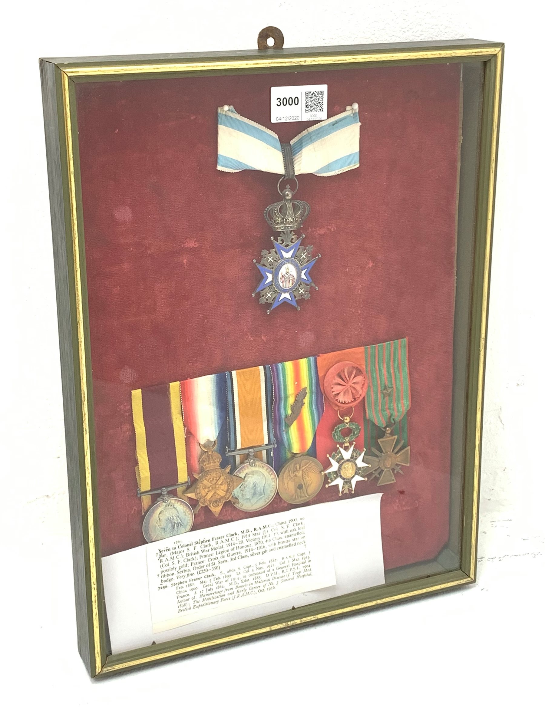 Group of seven medals/awards to Col. Stephen Fraser Clark M.B. R.A.M.C. comprising Victoria China 1900, no bar (Major S.F. Clark R.A.M.C.); 1914 Star (Lt.-Col. S.F. Clark R.A.M.C.); British War Medal 1914-20 and Victory Medal 1914-19 with oak leaf (Col. S.F. Clark); French Legion of Honour 1870 4th class enamelled; French Croix de Guerre 1914 -1916 with bronze star on ribbon; and Serbian Order of St. Sava 3rd Class silver gilt and enamelled neck badge; framed with some biographical information