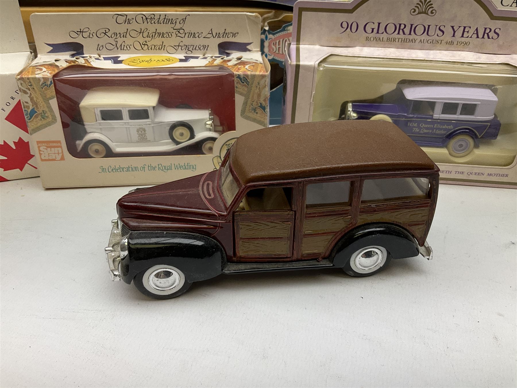 Collection of Diecast model vehicles, including Lledo The Golden Days of the Film Industry limited edition set, Lledo H Samuel boxed vehicle, and other similar examples 