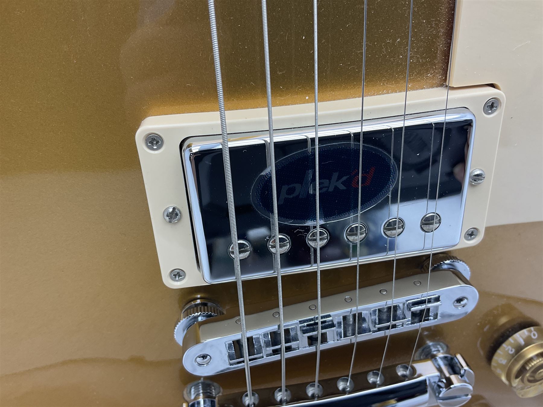 2011 Gibson Les Paul Traditional gold top electric guitar; serial number 103110461; with  mahogany back, twenty-two frets, 57 Classic humbuckers and bridge/stop bar tailpiece L100cm; in Gibson hardcase with owners manual and associated paperwork