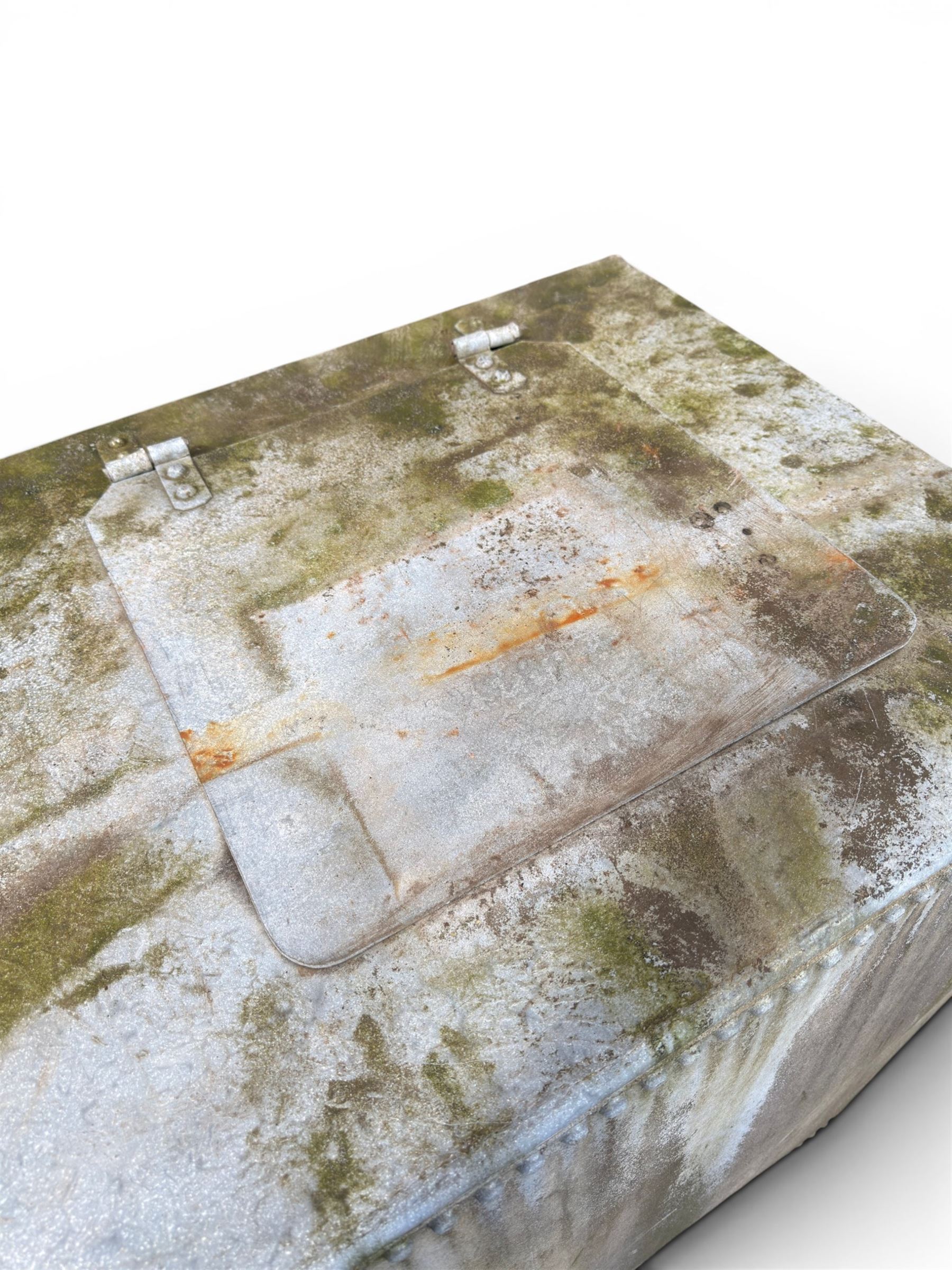 Large early 20th century galvanised water, cube form  with rounded corners and buttoned detail, with tap