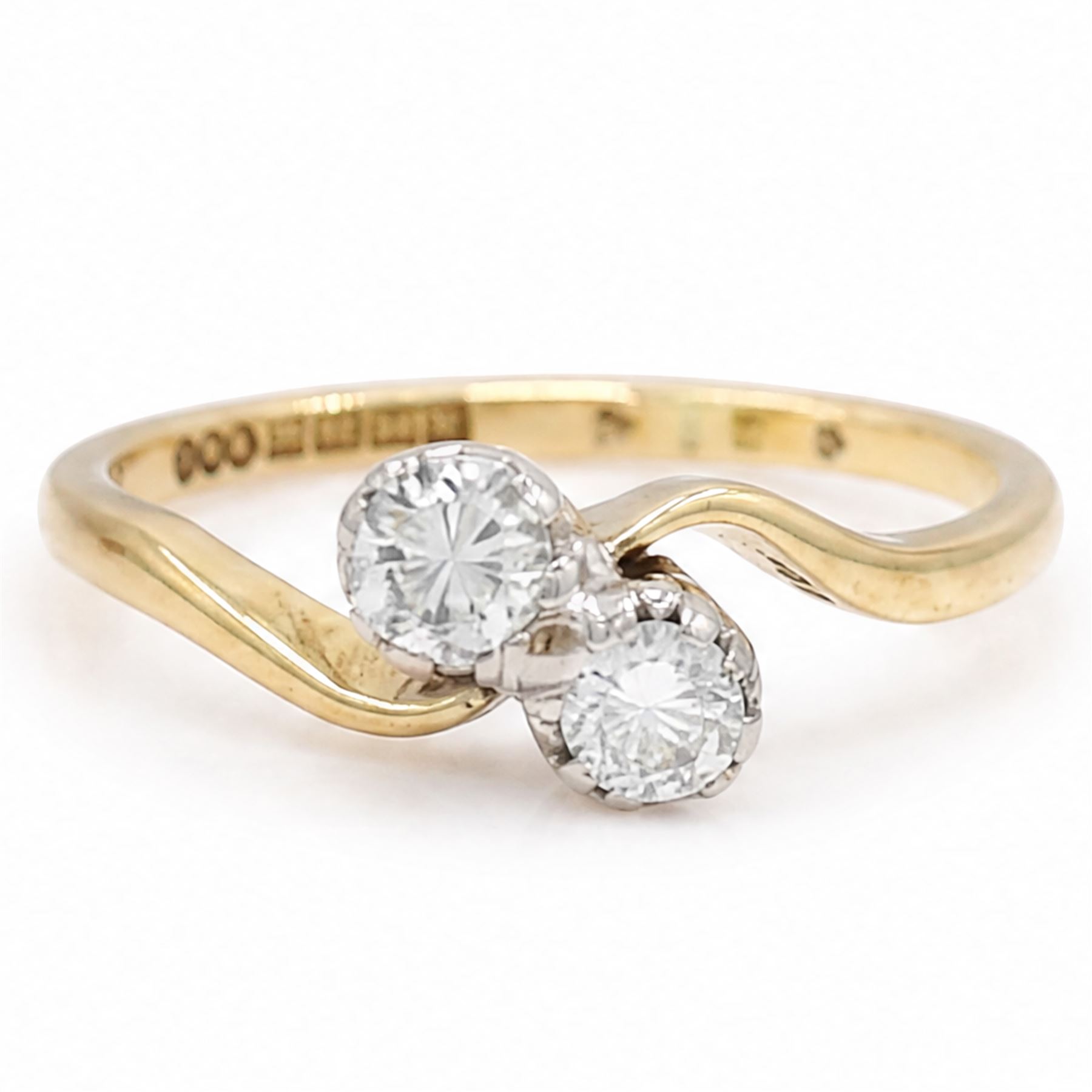 18ct gold diamond ring, crossover set with two round brilliant cut diamonds, Birmingham 1966, total diamond weight approx 0.30 carat