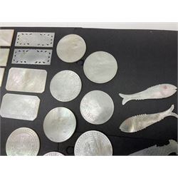 Collection of fifty seven Chinese mother of pearl gaming counters or tokens, of various size and form including rectangular, circular and fish shaped examples, various decoration including floral motifs, largest rectangular examples L6cm