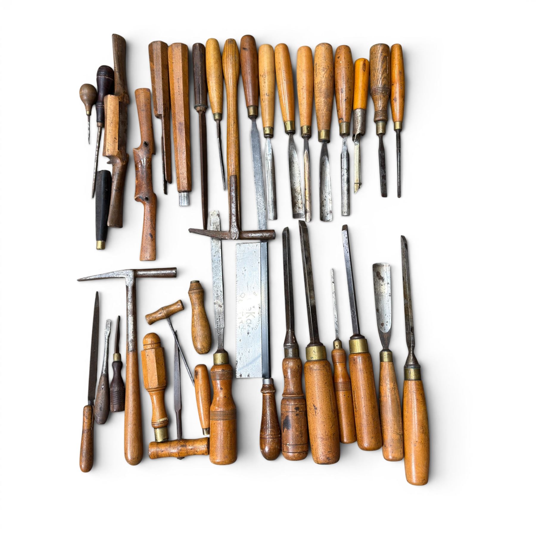 Collection of planes and woodworking tools including wood planes, chisels, hammers etc along with three books (Antique Woodworking Tools, Timber Preservation and Woodworkers Pocket Book)