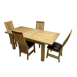 Light oak rectangular extending dining table, with additional leaf, and set four high back chairs with vertical slats and padded seats