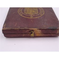 Victorian Trinity College Dublin silver medal, depicting bust of Elizabeth I, with arms of the college verso, awarded to Johannes Jacobus Browne S 1859,  Politica Et Literus Anglicis, in tooled leather fitted case with gilt detailing