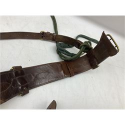 British Army Officers Sam Browne leather belt with shoulder strap; and webbing belt with Potter London Staybrite buckle for 19th Regiment of Foot (Green Howards) with various markings (2)
