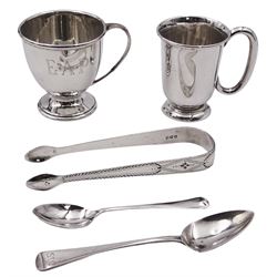 Group of silver, comprising a small mid 20th century christening mug with C handle, upon spreading circular foot, hallmarked Viner's Ltd, Sheffield 1963, H6.5cm, a further mid 20th century example with wide bowl, hallmarked Joseph Gloster Ltd, Birmingham 1958, a pair of George III bright cut engraved sugar tongs, hallmarked London 1804, makers mark worn and indistinct, a George III Old English pattern teaspoon, and a modern coffee spoon, approximate total weight 5.88 ozt (182.8 grams)