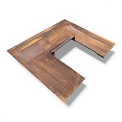 Two cast iron fire surrounds / inserts along with four metal surround pieces 