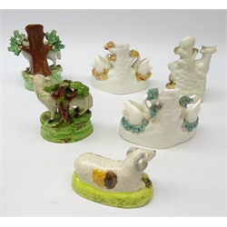  19th Century Staffordshire figure of a sheep and lamb in bocage, similar later model, Milkmaid & Cow, two Swan and Cygnets spill vases and recumbent ram (6) Provenance: From a Private Yorkshire Collector  