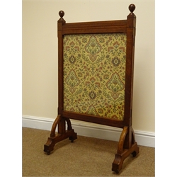  Arts & Crafts oak framed fire screen, two glazed doors enlcosing floral tapestry panel, on arched supports with castors, W62cm, H109cm, D38cm  