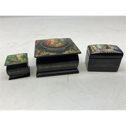 Four 20th century Russian lacquered and hand painted boxes, each signed/inscribed, largest oval example H14cm W9.5cm