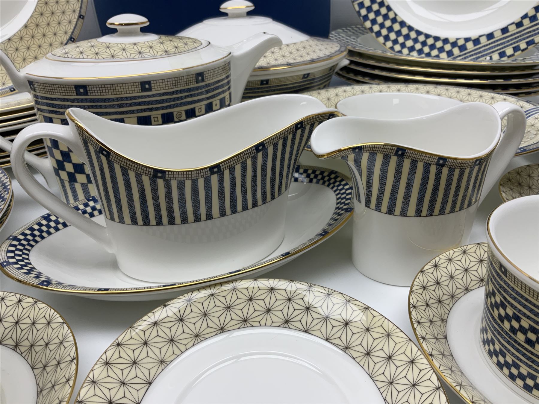 Wedgewood Samurai pattern, part tea and dinner service, to include teapot, open sucrier, milk jug, six cups and saucers, six dinner plates, six soup bowls, covered twin handled service dish, sauce boat and saucer etc (46)  