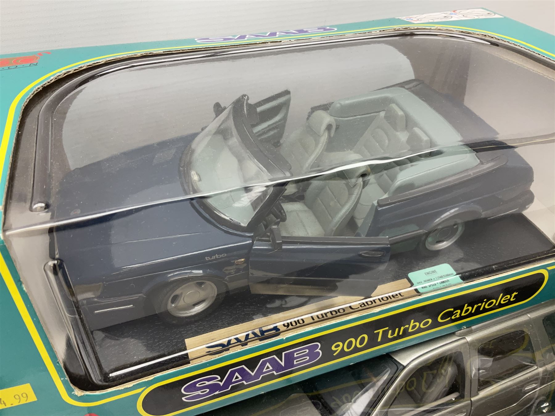 Five Anson 1:18 scale models - limited edition Cadillac Escalade 2002; Dodge Ram 3500; 1963 Ford Thunderbird; Saab 900 Turbo Cabriolet; and Ferrari Dino 246GT; all boxed (5)