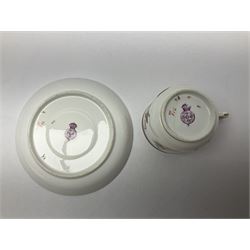 Royal Worcester coffee pot, coffee cup and saucer, all decorated with floral sprigs and butterflies, the coffee pot with a bamboo handle, H23cm