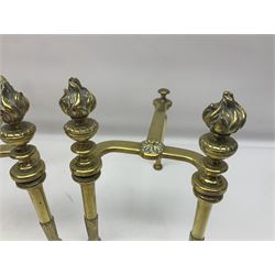 Early 20th century brass coal bucket with pierced sides, upon three pad feet, together with a pair of brass fire dogs, with flambe finials, coal bucket H27cm